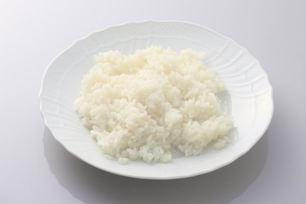 Add a spoon before cooking. Any raw rice can make a fresh texture 